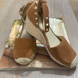 Marc Fisher suede Espadrilles with gold accents.